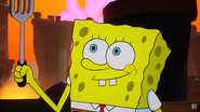 SpongeBob picking up his spatula.