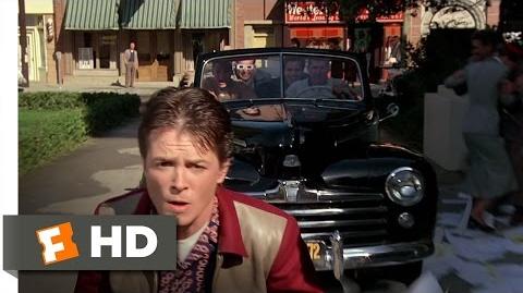 Marty McFly escapes from Biff Tannen & his gang by causing them to crash their car into a manure truck.