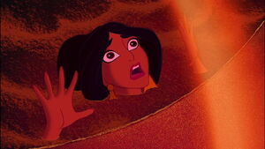 Jasmine imprisoned in a giant hourglass by Jafar as she’s at the risk of being buried alive.