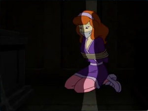 Daphne Blake gets captured and tied up multiple times (Like for example, She gets tied up by two undead soldiers).