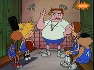 Coach and his basketball team