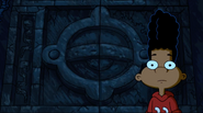 Gerald discovering a hidden door with the Green-Eyes' symbol