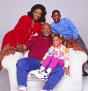 Lauren Robinson as 'Vee' Forman with Sheryl Lee Ralph, George Foreman, Tony T. Johnson in 1994 sitcom George.