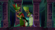 The king and queen bowing to Miles and Stella