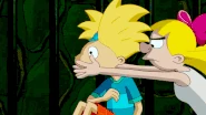 Helga covering Arnold's mouth