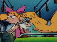 Helga cuts Arnold's hair