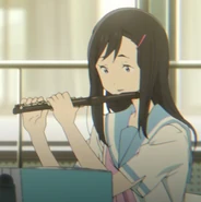 Sari practicing piccolo.