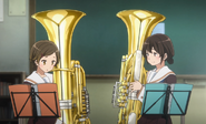 Kazuki and Riko holding the Tuba