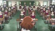 The band members listen to President Kumiko