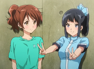 Here you see Kumiko on the left and Azusa on the right while doing the peace sign on both hands.