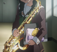 Aoi holding a Tenor Saxophone