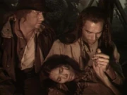 Connor réconforte Duncan qui vient de perdre sa famille indienne.