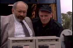  Cominski and the SWAT team leader witness an execution.