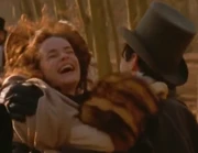 Claire clings to Methos during a wild carriage chase