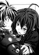 Issei embraced by a teary-eyed Rias following his return