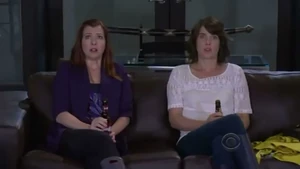 Robin and Lily watching the news.