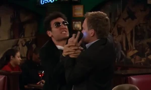 Ted and Barney fight over the phone.