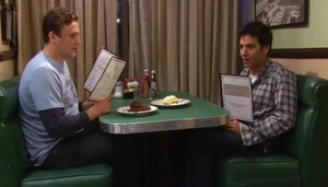 Ted and Marshall hiding out at diner.