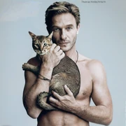Tommy with the ceiling cat, as he appeared in WonkyTonkBotty's parody, "Hitler plans to kill Fegelein's new cat". Also nicknamed, "Feg-feline"