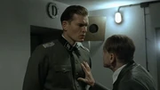 Hitler touching Günsche's boobs.