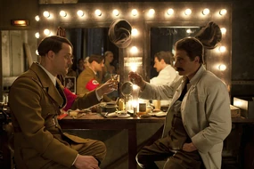 Hotel Lux Hitler has a toast with Stalin.