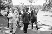 Hitler walking with Göring, Günsche and Speer.
