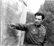 Chuikov pointing at a map. Note post-1943 shoulder board insignia based on pre-Revolution Imperial uniform.