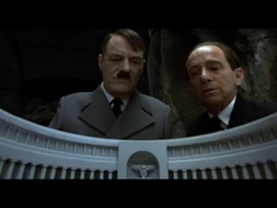 A. Hitler Hitler along with his Goebbels looks in his boob building.