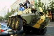Fegelein and Himmler running over Hitler's car in a BTR-80 APC.