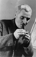 P75.jpg (9 KB) Simonov in later years, smoking his pipe.