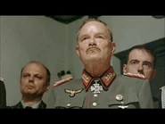 Keitel and his adjutant Ernst John von Freyend hear Skeletor’s speech.