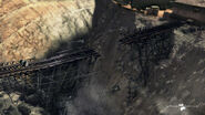 Ditto, early concept art of the destroyed railroad bridge, changed in the final game.
