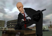 Agent 47 assembling the R93.