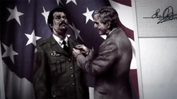 Travis riceve la medaglia di bronzo da George H. W. Bush