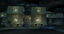 The exterior of the asylum, as seen in Codename 47.