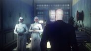 47 walking past two unnamed nuns as they talk about the field trip.