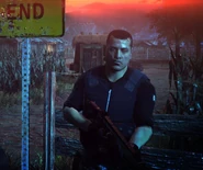 Full Body of Thomas C. Cruz, under the "Dead End" sign.