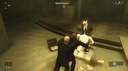 Agent 47 garroting a gangster before he can burn the divorce lawyer in Blood Money.