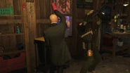 47 knocking out a Militia Elite with the Fire Extinguisher.