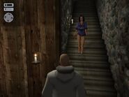 Lei Ling walking down the stairs towards 47.