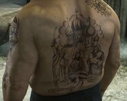 A close look at the tattoos across Khabko's back.
