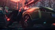 Agent 47 putting a bomb under The King's car.