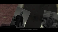 Agent 47 studying Schmutz's photo.