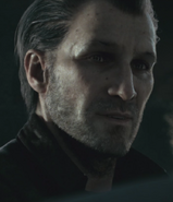 A close-up of Lucas Grey's face from The Pen And The Sword cutscene.