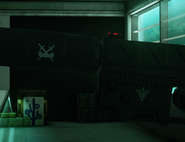 A closeup of the emblem on the suppressor, along with the emblem on the flashlight/laser module.
