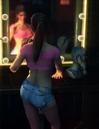 Christine McCray applying make up in the level " Dressing Rooms ".