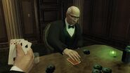 Civilians playing cards/poker inside the luxurious room.