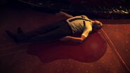 Rodney's corpse as he lays in his own blood.