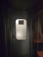 九鐵英製列車翻新前車廂內的由普通等通往頭等的門