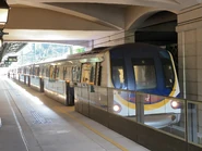 迪士尼綫列車在迪士尼站上落客